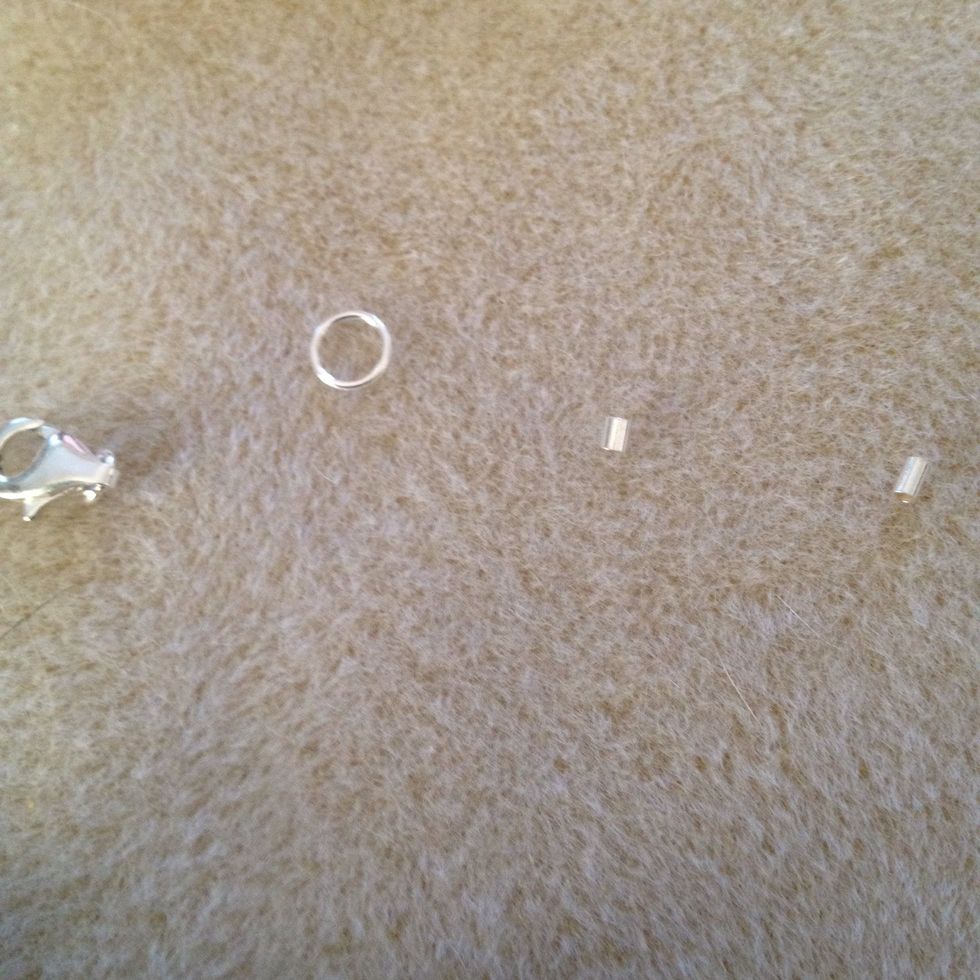 Now you will need silver findings for your necklace. Like these. If your like me I can't wear fake metal as it irritates my skin. The findings aren't that expensive