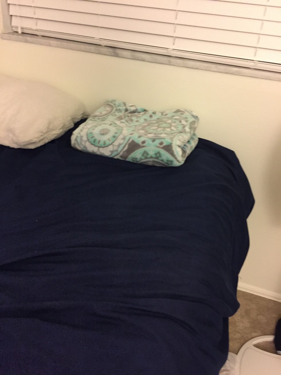 Now your blanket is ready to be placed at the edge of your bed, in a drawer, or a basket!