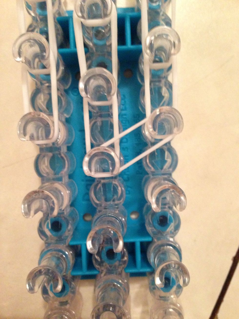 Now your gonna just take two and kinda close off the head of your panda