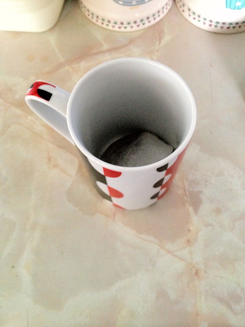 Now your kettle is boiled place one teabag at the bottom of your cup. Ensure that its flat so it gets filled with water straight away.