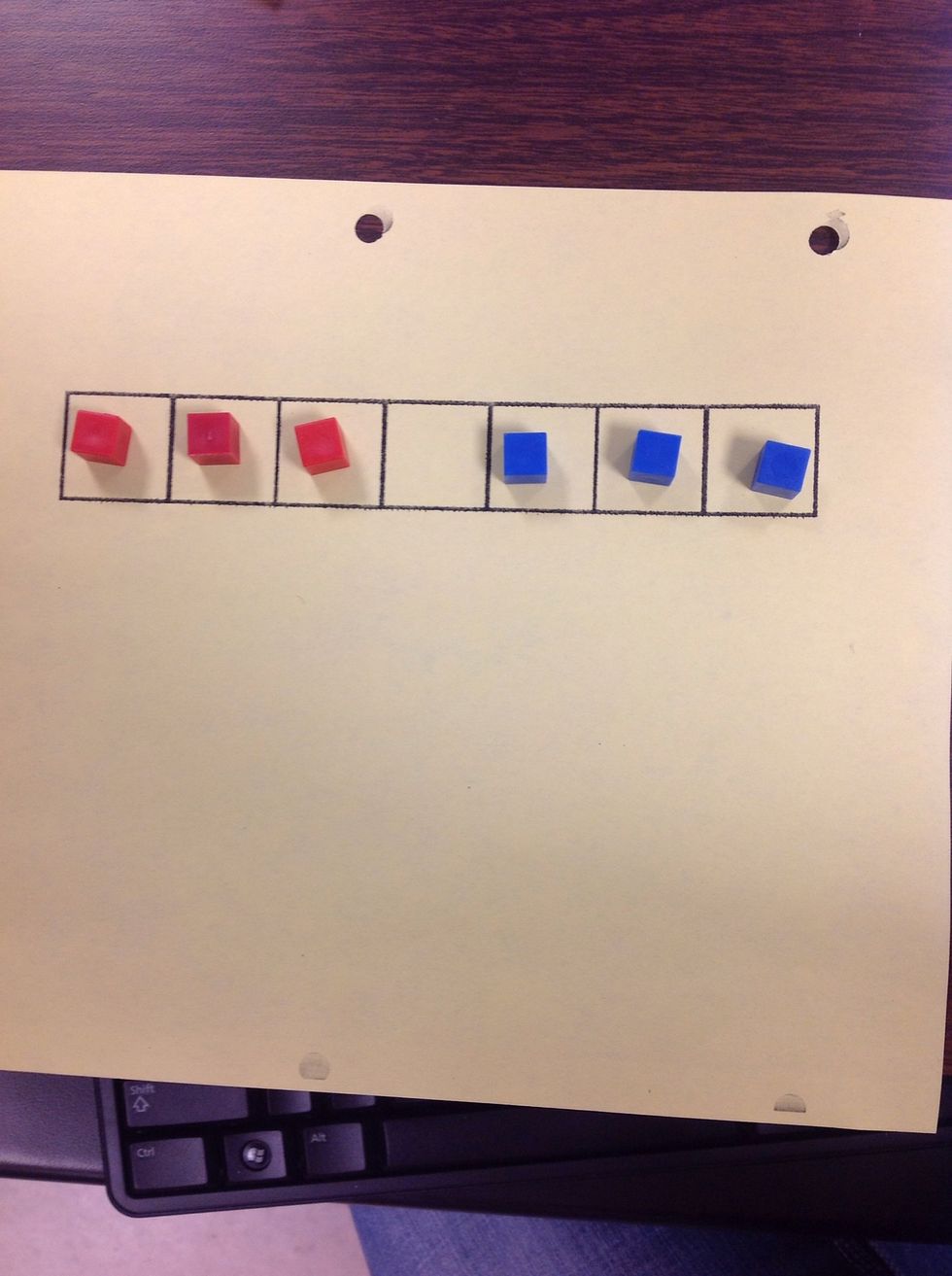 Object of the game: Move 3 red blocks to right side and 3 blue blocks to left side.