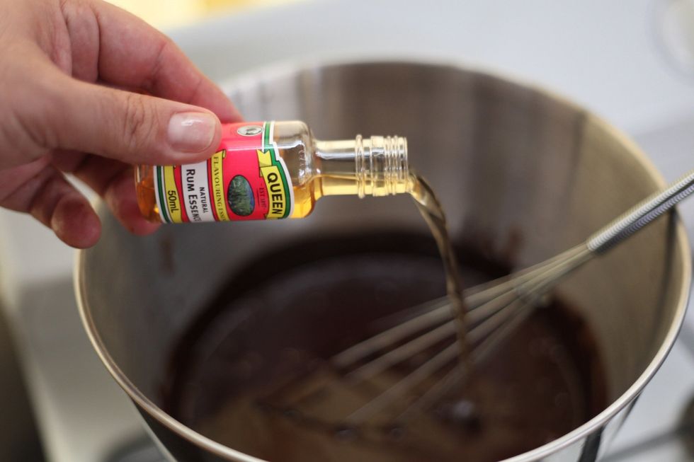 Of course it's best to use dark rum in this recipe, however for non drinkers use rum essence. 40-50 ml depending on how strong you want the taste. I used the whole 50 ml. Keep stirring.
