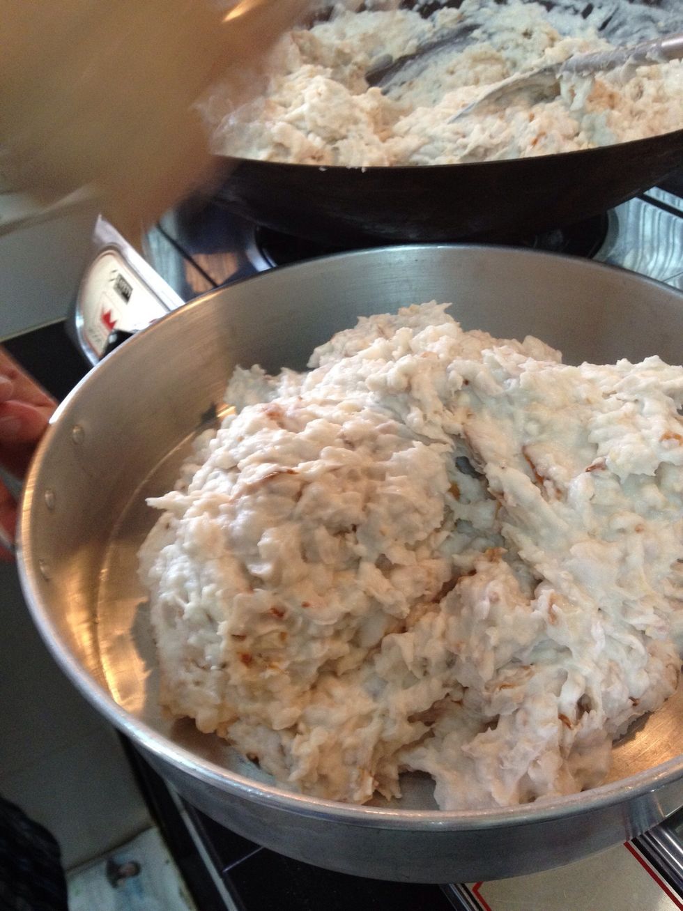 Off heat and transfer mixture to pans.
