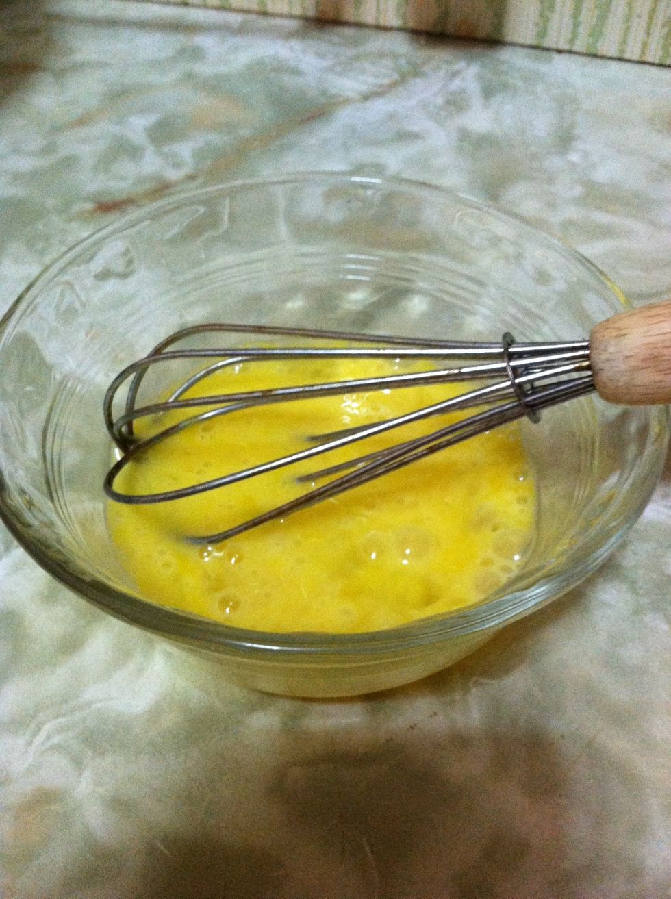 Off to the side, in a small bowl, whisk your egg.