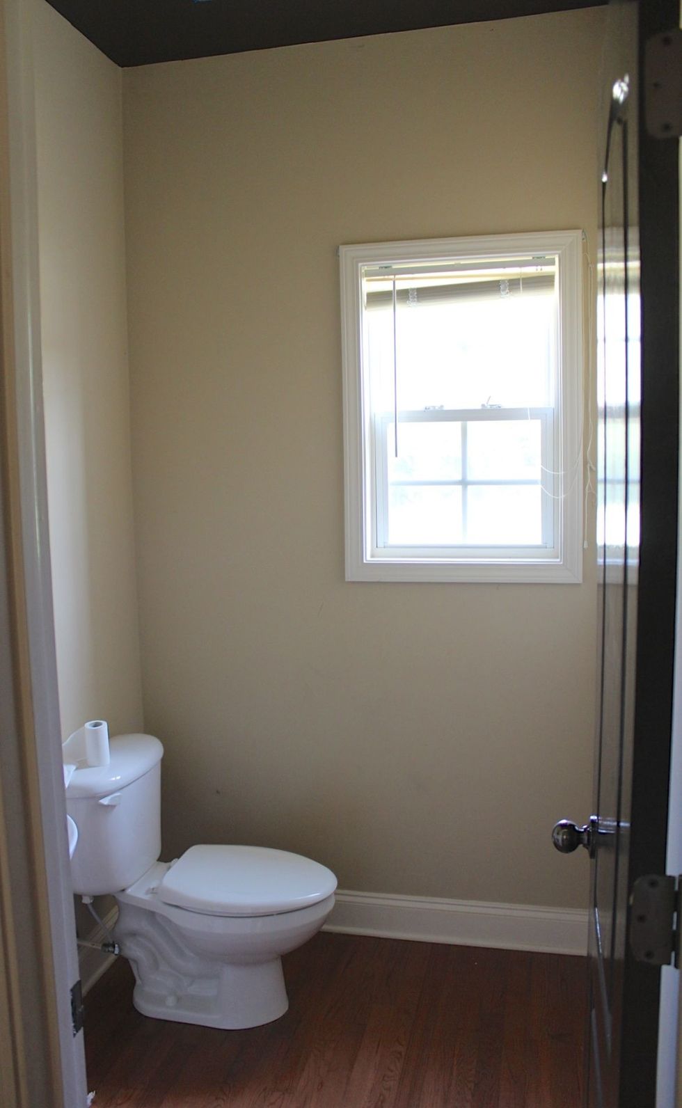 Often referred to as the fifth wall, paint the ceiling to create a cozy atmosphere. Here I used a deep brown in a high gloss finish.