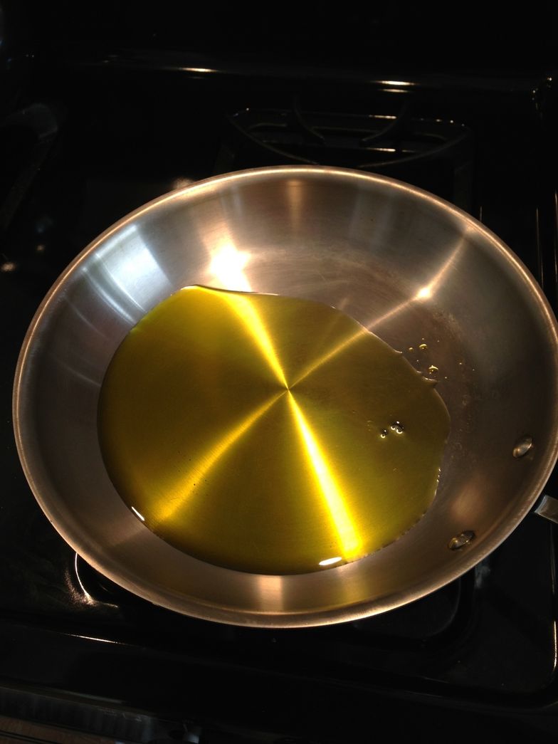 https://guides.brit.co/media-library/oil-goes-in-a-large-saut-u00e9-pan-medium-heat.jpg?id=23934313&width=784&quality=85