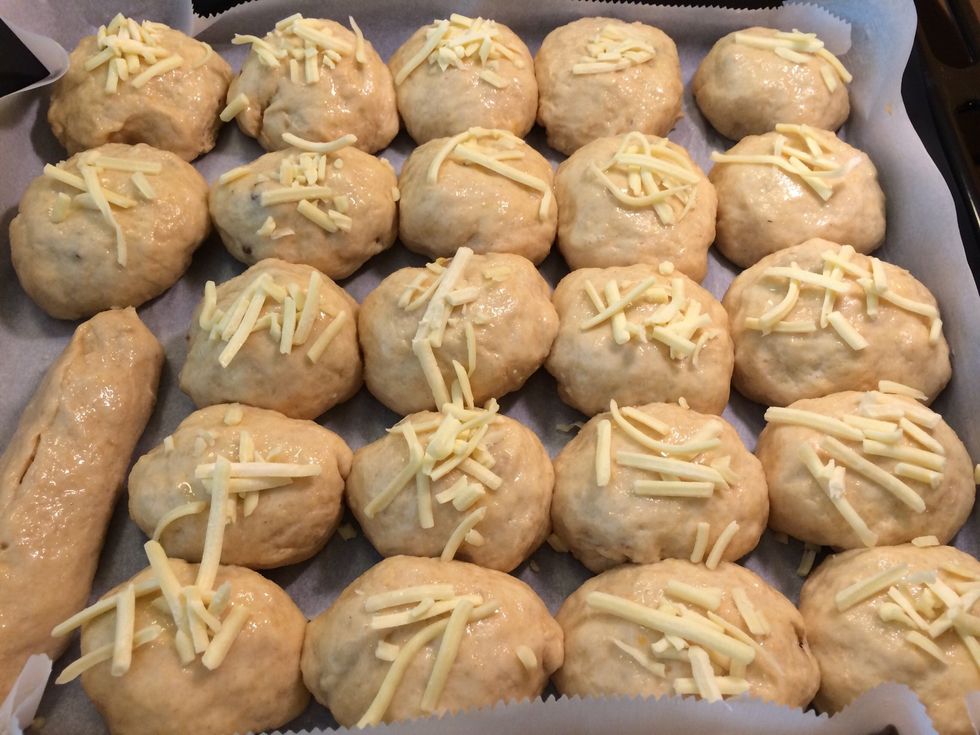 Oil hands n shape into balls. Flatten n fill with whatever filling you like. Seal up n place on pan. Allow to rest for 10 min. Glaze with egg wash. Bake 15-20 min or until golden brown