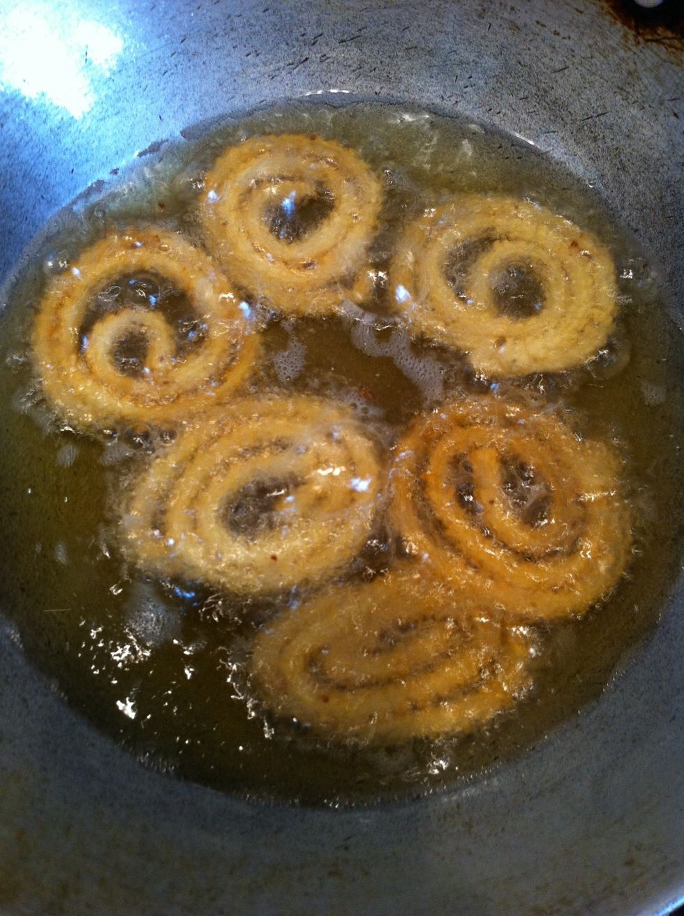 Oil should be hot to test put a small piece of dough in oil and if dough sinks then oil is not hot and if hot it starts to float and deep fry till it turns golden brown colour