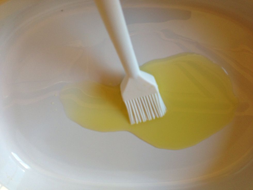 Oil the bottom of a ceramic baking dish well with a brush. The oil on the bottom will prevent the potatoes from sticking to the dish so be generous.