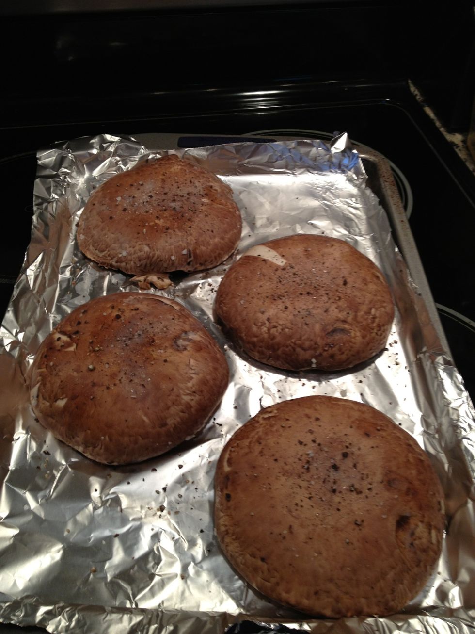 Oil the top of the mushrooms and sprinkle with salt and pepper. Place on a tray as depicted in the photo. Bake for 10-15 minutes @400 degrees or until golden brown.