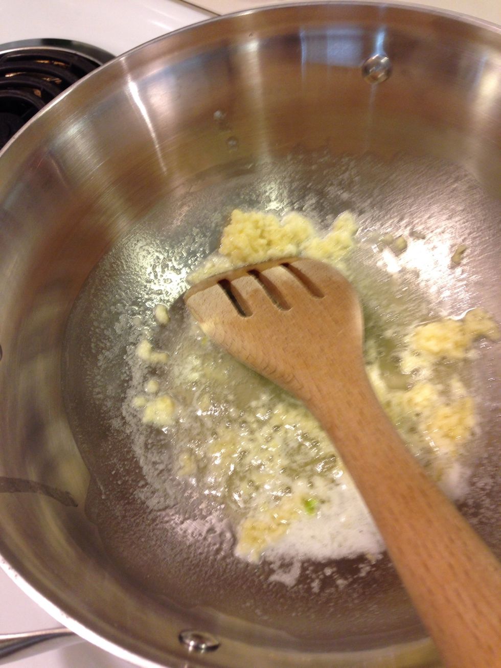 Ok add the 2 tablespoons of butter to a pan on medium- high and once hot add garlic, cook 2 minutes
