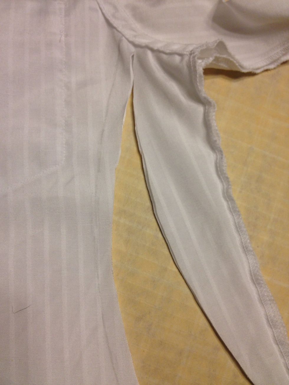 Ok. Back to work!! Remember to leave a 1/2 inch seam allowance. Cut from the bottom up. Remember it's from the bottom/side.