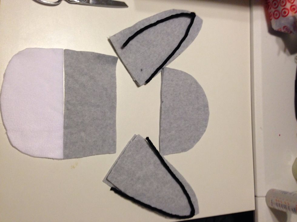 Ok I brought all my pieces and for the head, i cut where my mark was in half.  I just placed the ears next to the head so u can see what im trying to visualize.  Placement.