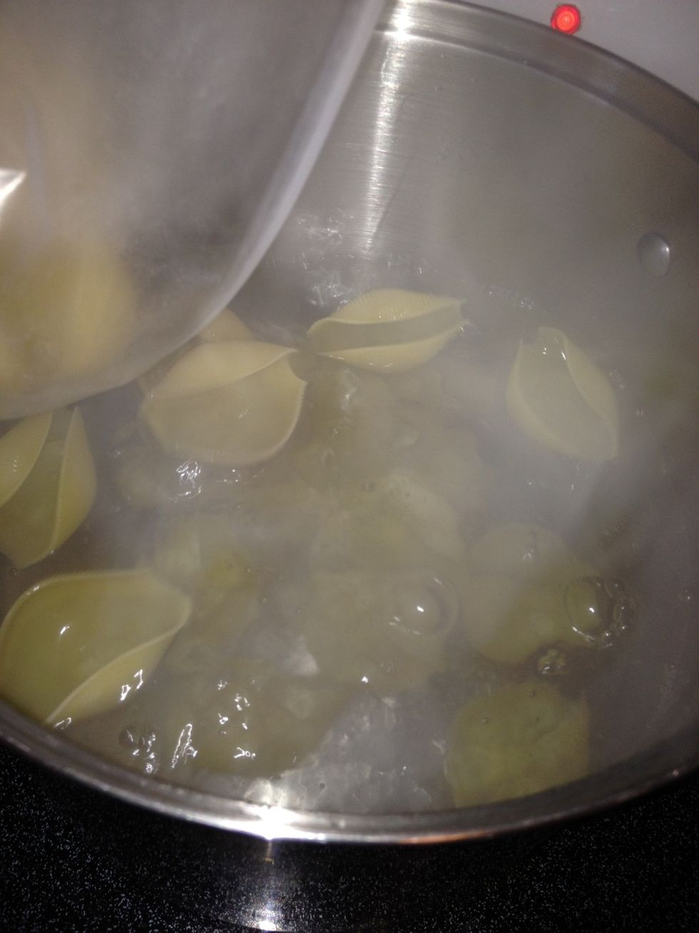 Ok it's finally boiling! Throw them in!! I think I counted about 40. These are not the huge ones. Don't get me wrong they're big but not the size where eating two is enough. ;)