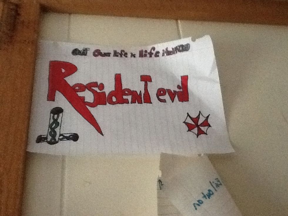 Ok now do you see those tubes. draw those then uses your green marker and color in the one that is standing green then use your blue marker and color in the one that is besand it.