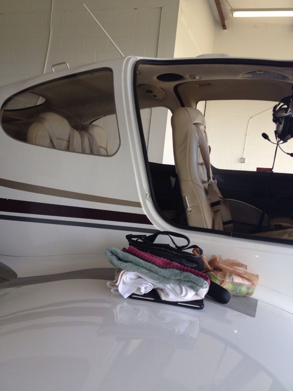 Ok now the challenge to take the plane out. They have this little machine kind of like a mower puller or tower that Ron starts,steers and pulls it out. Does the plane have a name?