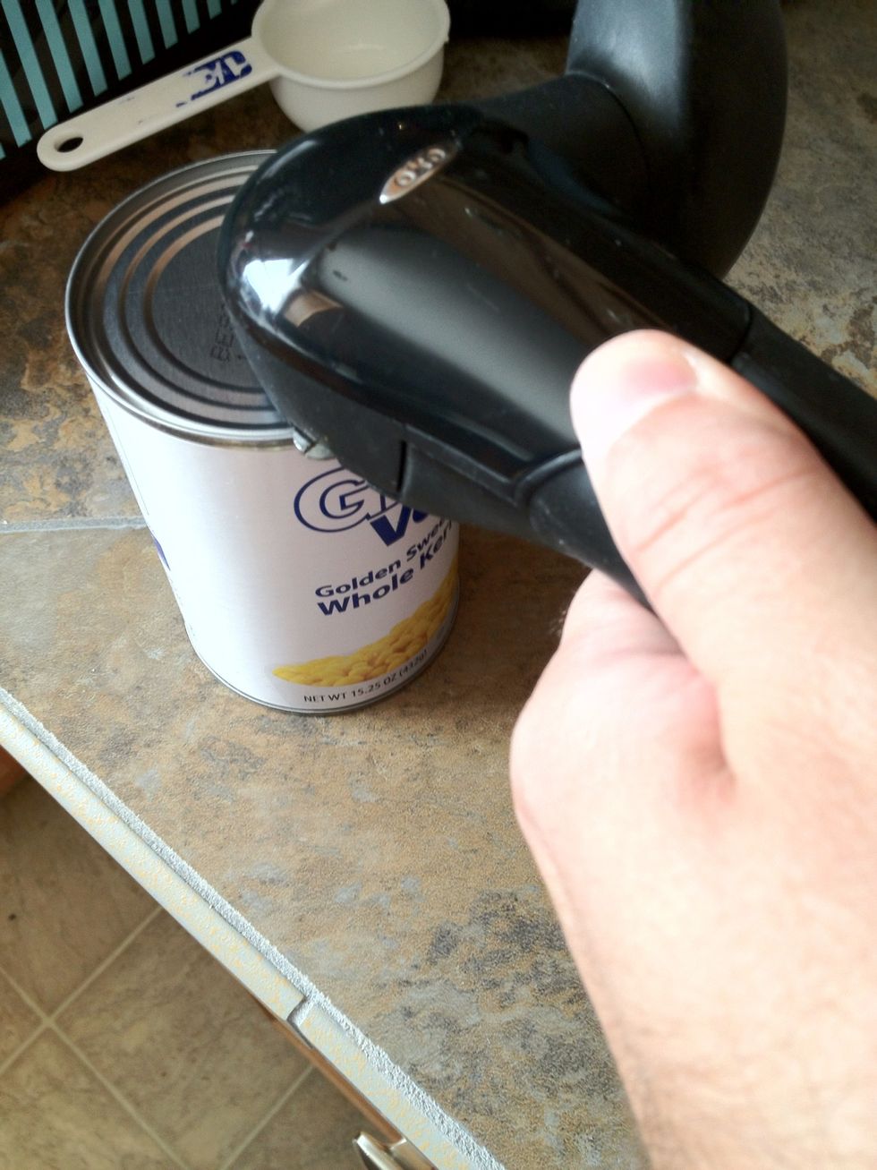 Ok, open all the cans, and drain as much liquid as you can from the corn and potatoes.