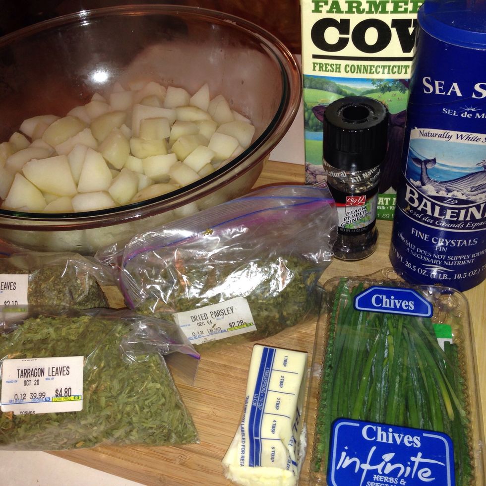 Ok put in the butter, a little milk, chives, and the dried spices and smash it up!