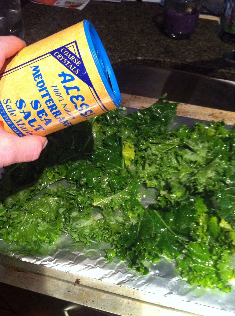 Ok so I added the salt on the baking sheet & then decided it was better to mix it in w/ the oil. Be careful- don't use too much salt! A light dusting. Had to show this pic bc Alessi is my cat's name!