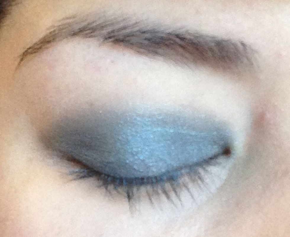 Ok so now I have Aqua all over my lid. It should look like this. This also lets you see my flimsy little eyelashes which I will fix later with falsies. Lol