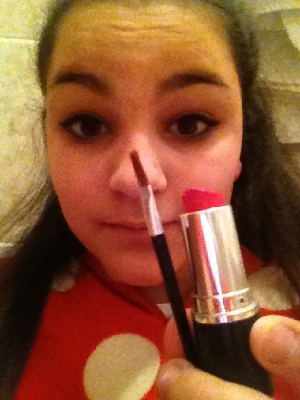 Ok take a lip stick and brush