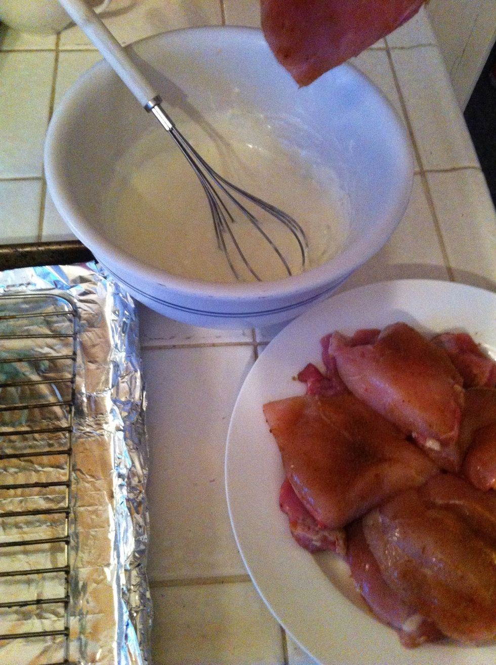 ok we're ready for that chicken now. oh wait did I already say to turn on your broiler, no? ok do it now. get that yogurt mixture ready. and put aluminum foil on a sheet pan with a rack on top.