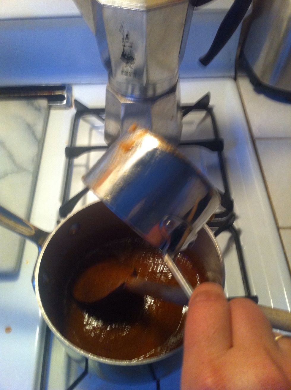 ok were making the hot sauce now! pull out 1and 1/3 cups of the sauce from the chicken's Dutch oven and put it into the small sauce pan with your spices and put over low heat.