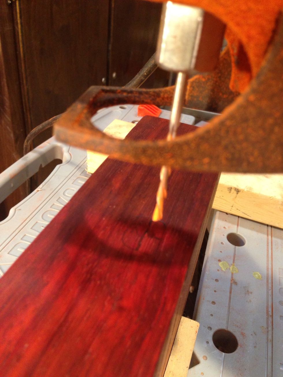 Okay measure thee times and drill your hole for all the chargers to run thru. I suggest go out the back but you could go out the bottom. Don't make the hole too big, say usb plug size.