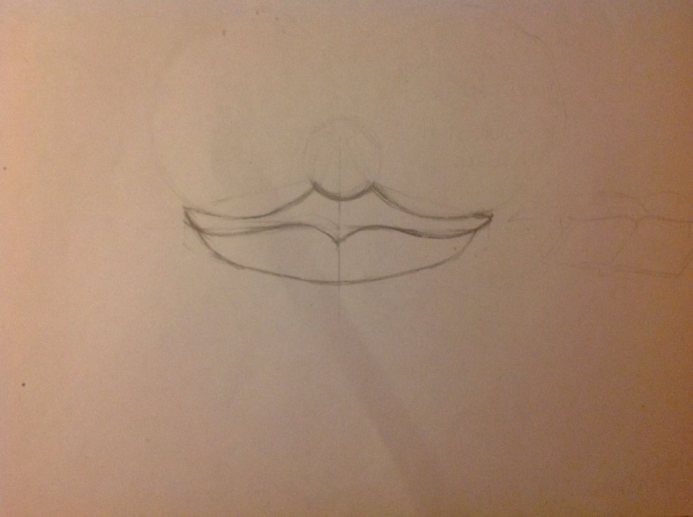 Okay! Now we can erase the circles and the lines! Time to model the lip
