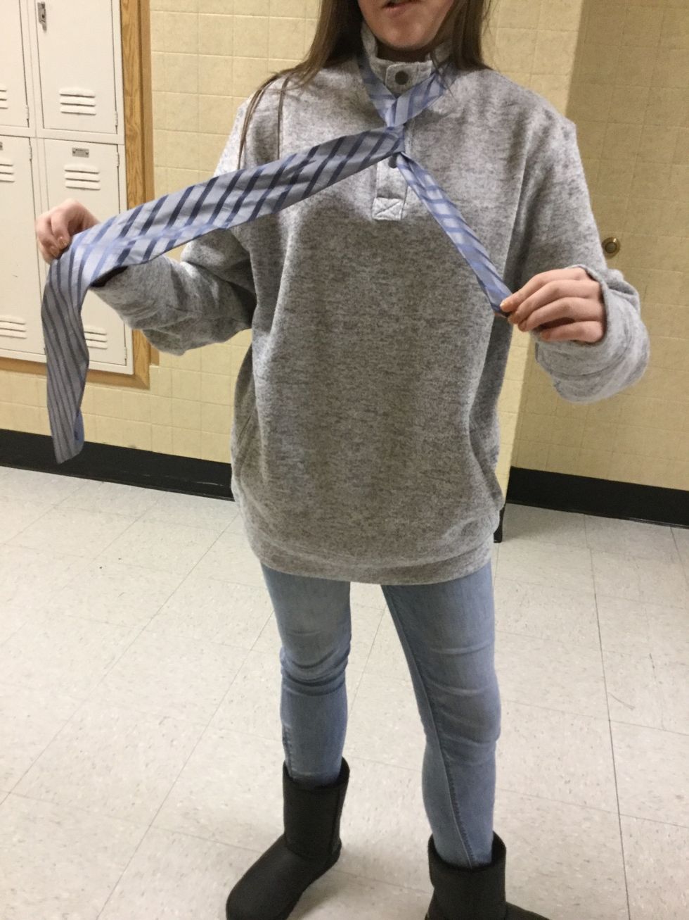 Okay so now you kind of repeat step two. You bring the fat side back over the the top so it is now on your right.