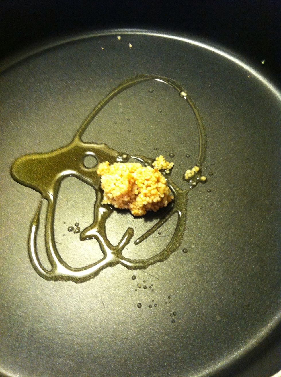 Olive oil and garlic in a pan on med-high heat.