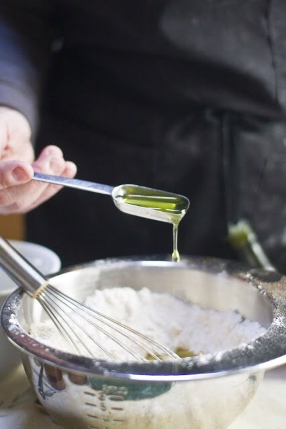 Olive oil. Mix it together until it's all combined.