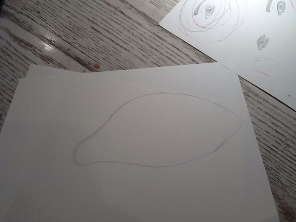 On a new piece of paper, draw the outline of the eye. Don't forget the little pink part! Draw this lightly, as you may have to go back and tweak it here and there.