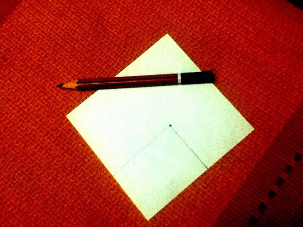 On a thick piece of craft paper draw a rectangle using the measurements of the light switch plug..
