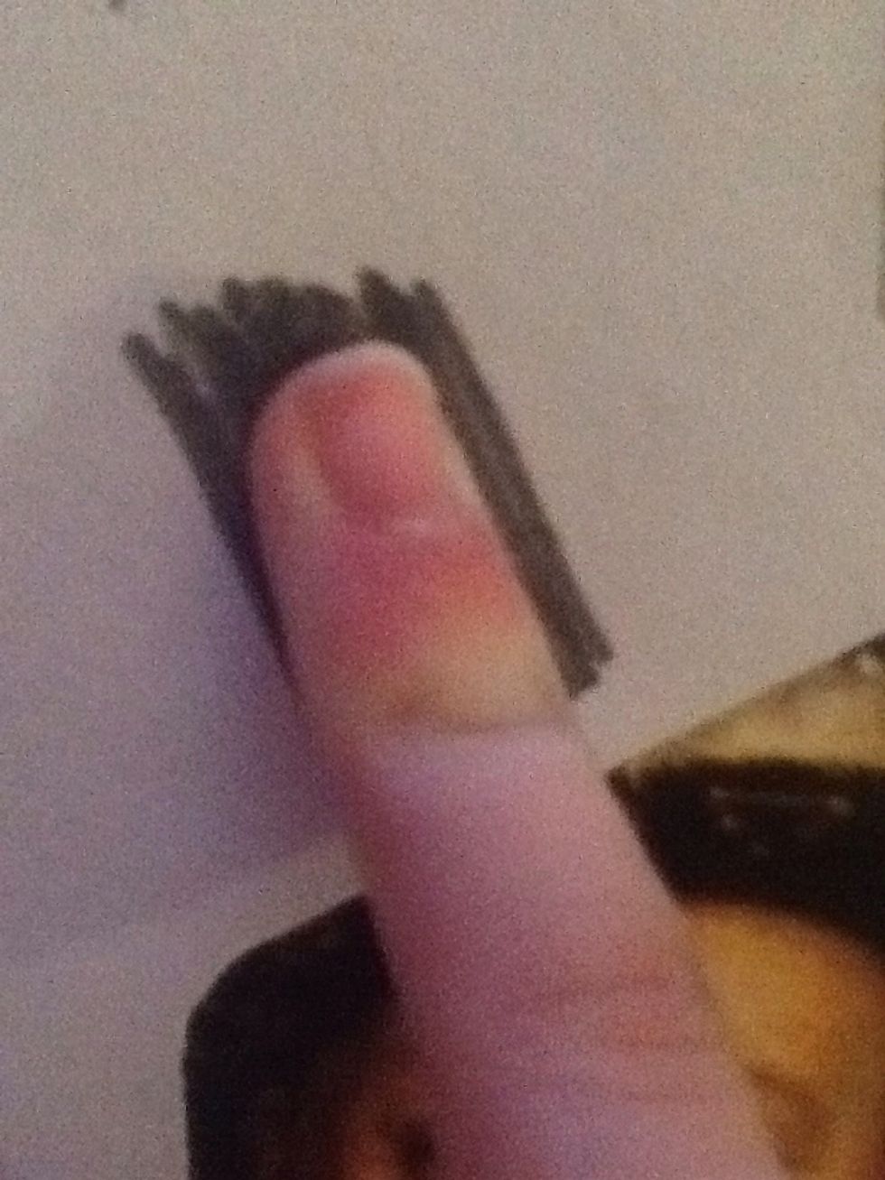 On another piece of card/paper do a scribble and smug your little finger in it.