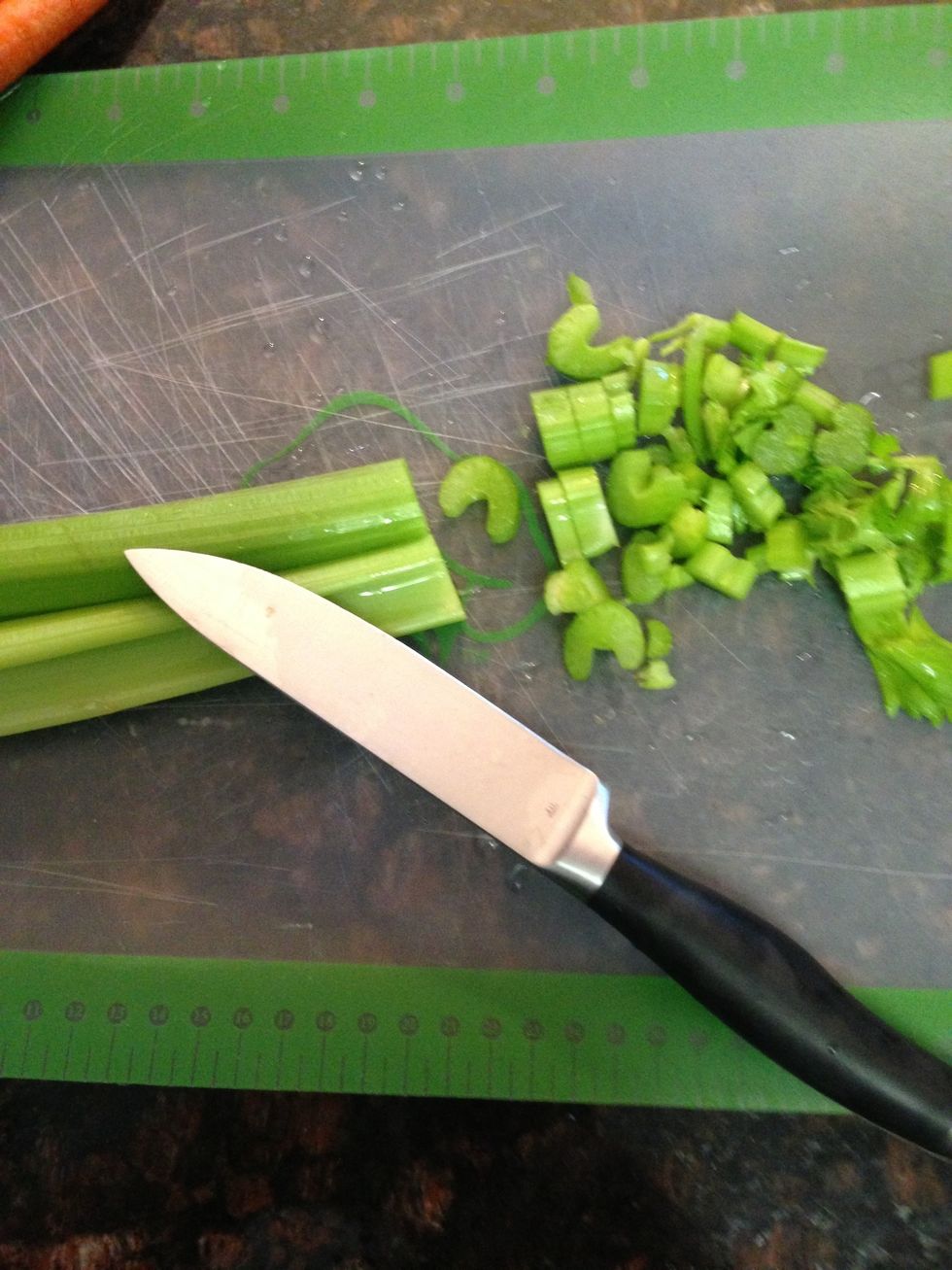On cutting mat, chop 2 stalks of celery