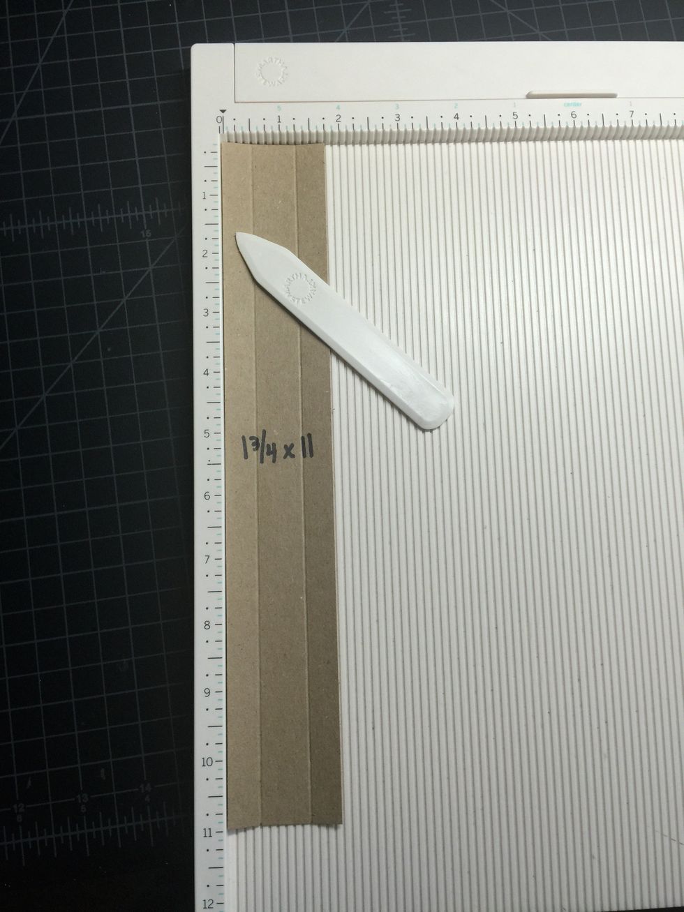 On each of the 3 strips (hinges), score at 1/2" and 1 1/4" as shown.
