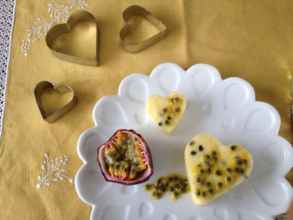 On each plate. Place a heart or two, topped with 1 tsp of passion fruit pulp. Serve with a half passion fruit on the side.