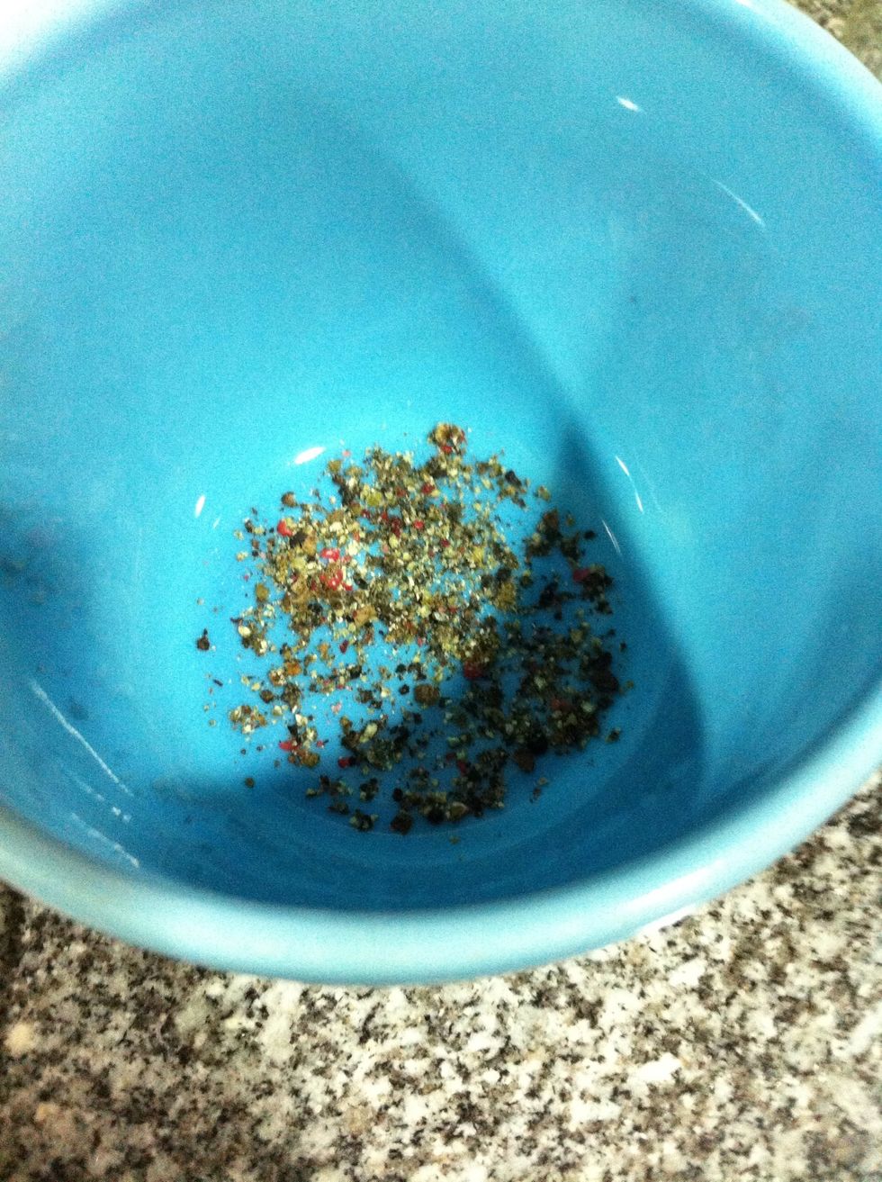 On for the dressing! Some generous grinds of pepper