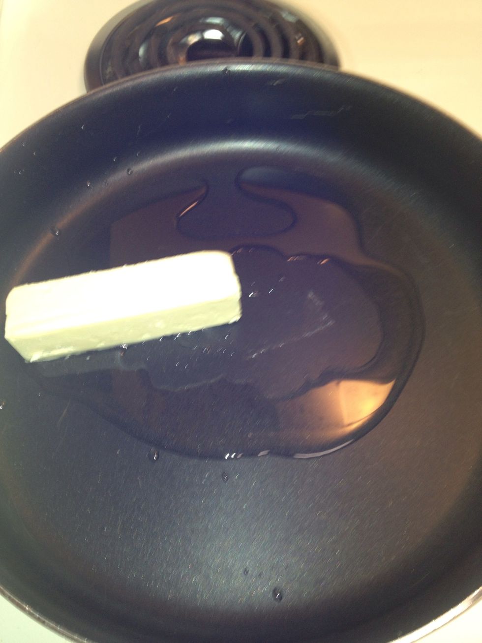 On high heat, place 2 sticks of butter and light oil into frying pan