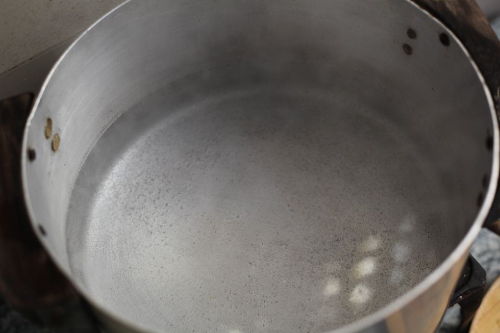 On low-med heat Boil about 1 little of water and put all the cabbage inside for just 2-3 minutes.
