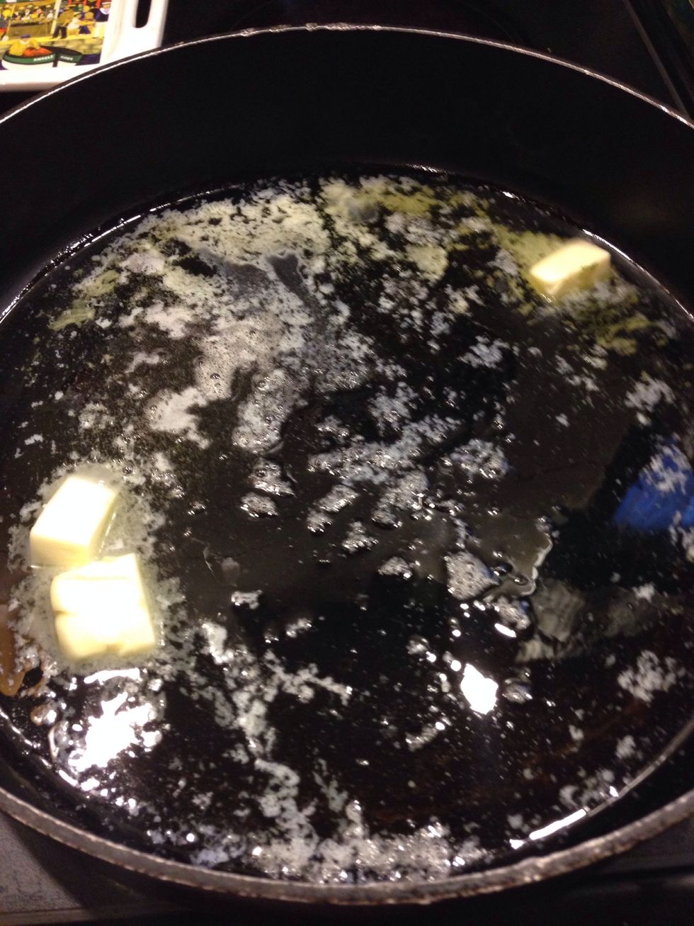 On medium heat melt oil, butter and garlic in a large skillet