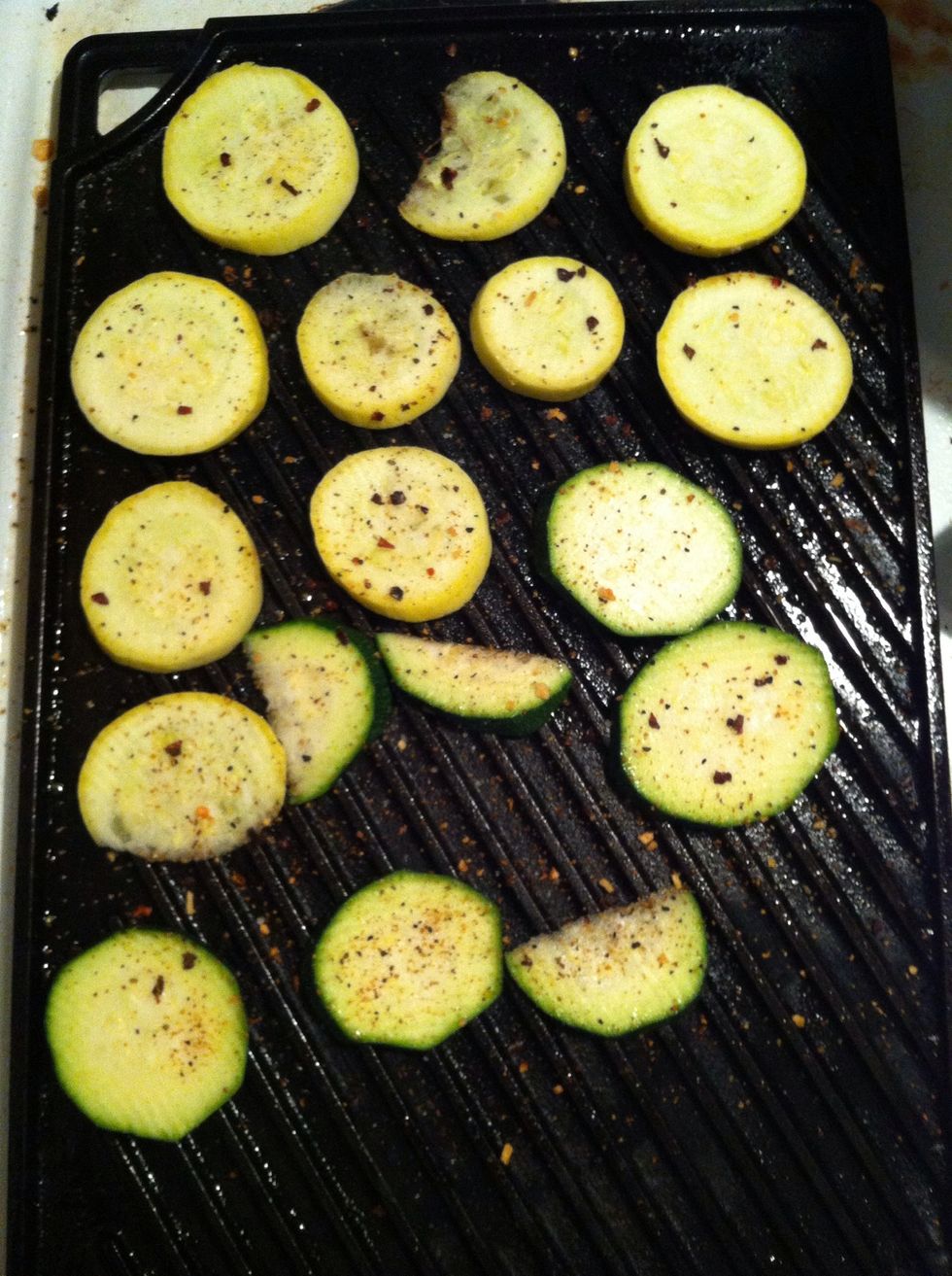 On medium heat spray grill pan with cooking spray and place zucchini and squash on to heated pan.