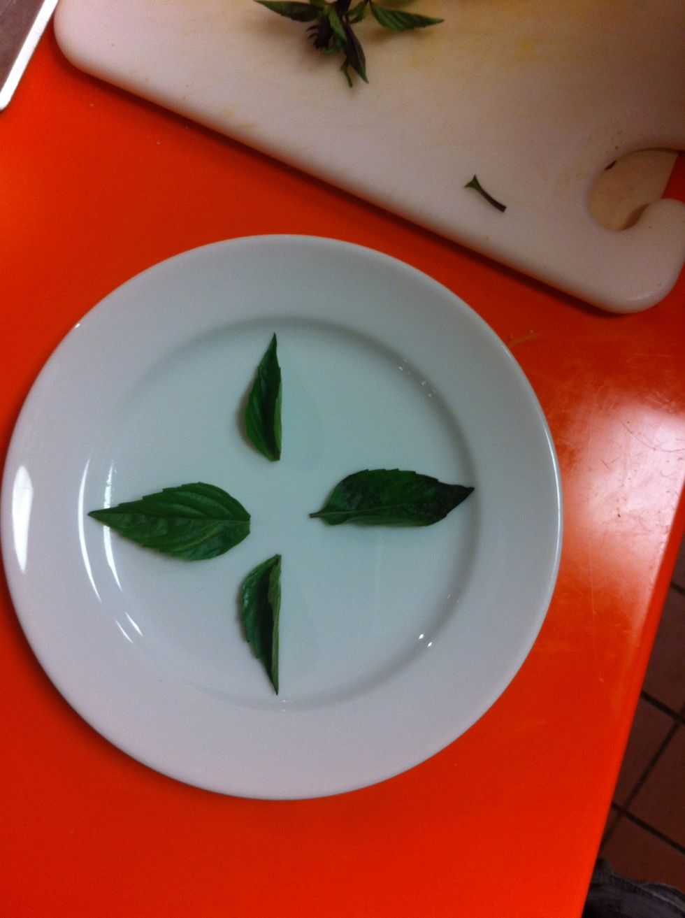 On Medium plate, arrange Thai Basil leaves in star pattern.
