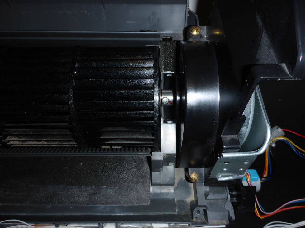 On my unit the crossfan was too close to the chamber wall. An easy fix: Loosen the fixing screw on the motor axle, and slide the fan a little to the left, then tighten.