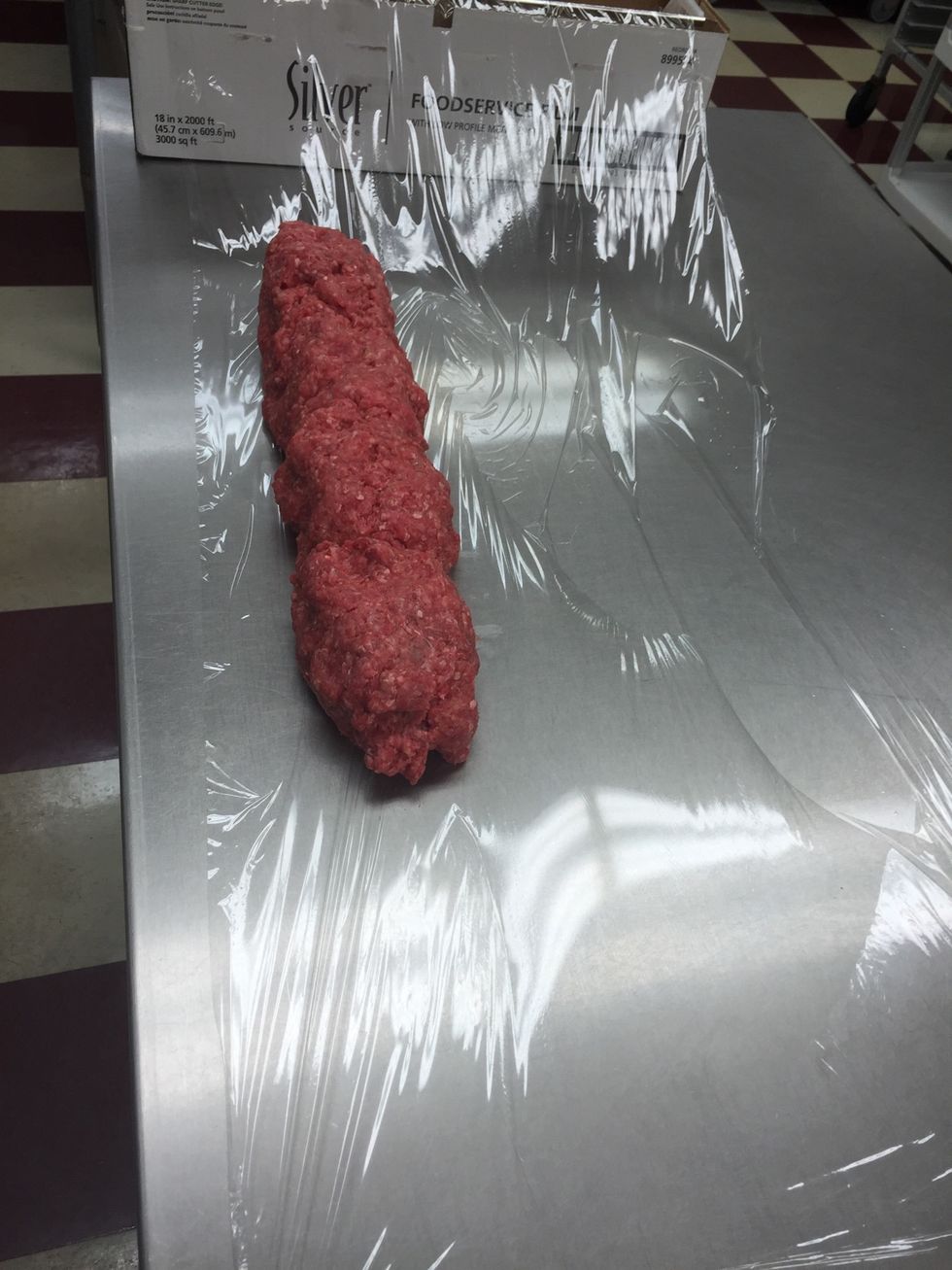 On one side start placing meat.