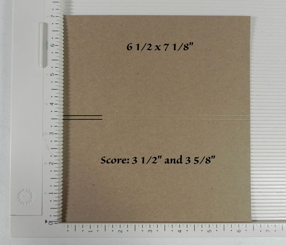 On the 6 1/2 x 7 1/8" pocket pages, score at 3 1/2" and 3 5/8" on the long side (7 1/8" side).