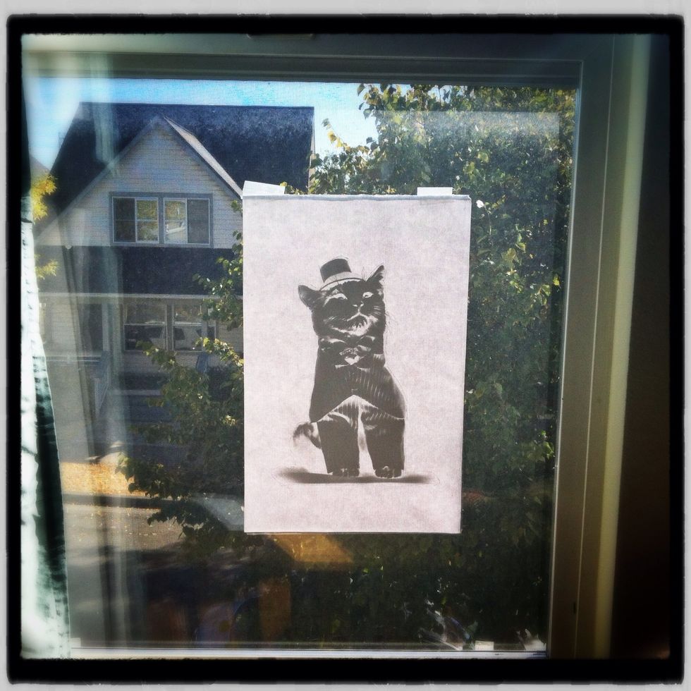 On the back of each INKOFILM transparency is a protective sheet of paper. Tape it to the front and put it on a window. Roughly trace around the image.