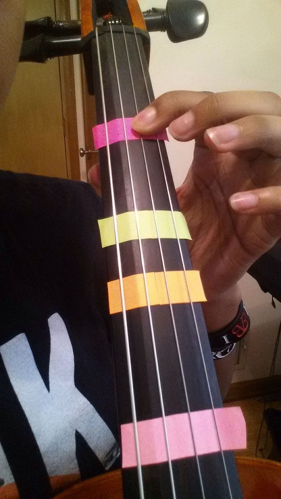 On the "D" string, first finger is on "E."