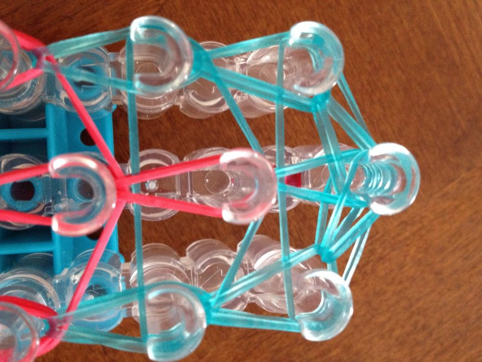 On the end, loop to the center peg